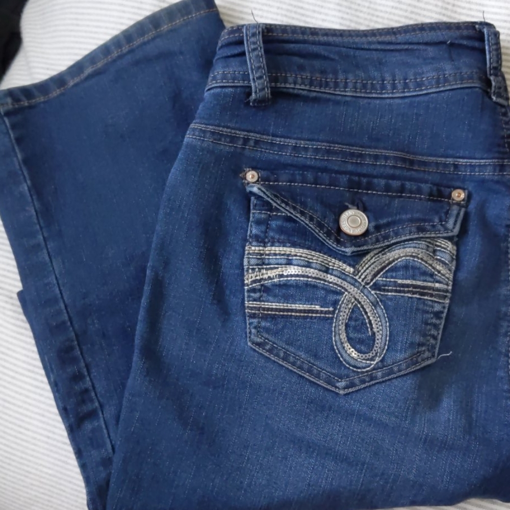 Dark wash stretchy high waisted boot cut jeans